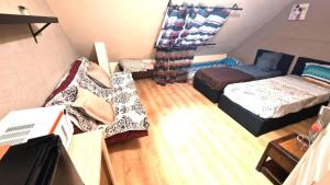 Sejours chez l'habitant Suite privative 2Chambres salle de bain prives toilettes 30 min de Paris : photos des chambres