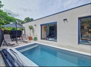Maisons de vacances Villa moderne 3 ch piscine privee parking : photos des chambres