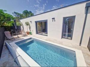 Maisons de vacances Villa moderne 3 ch piscine privee parking : photos des chambres