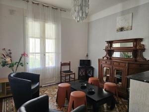 Appartements Les cigognes : photos des chambres