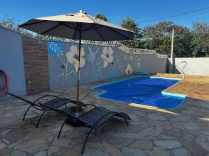 Edícula privativa com piscina climatizada no pé da serra