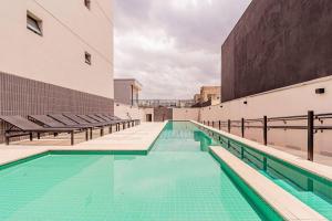 Aconchegante Studio com piscina, academia, coworking, lavanderia