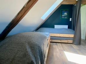 Maisons de vacances Maison cosy a 5 min de la plage de Poulziourec ! - FR-1-813-32 : photos des chambres