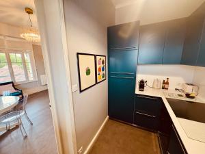 Appartements Le 31 Triangle d or : photos des chambres