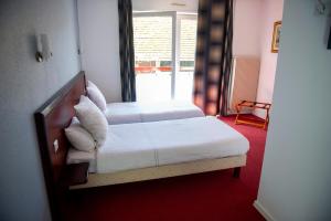 Hotels Logis Hotel & Restaurant Au Lion d'Or : photos des chambres