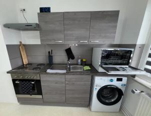 FeWo Elbo46 mit Balkon, Waschmaschine & Smart TV