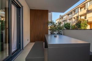 AZULIS 1 Pisano 2BR with 2 Terraces, Garden & Parking, Aldo Moro Olbia