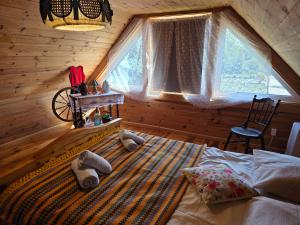 Pokój w domku z bala w Suszczy