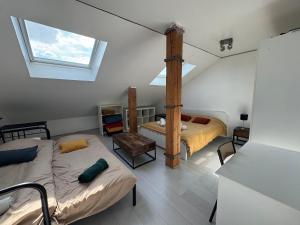 Maisons de vacances La Casa Nancy Tomblaine 12 pers Parking et Jardin : photos des chambres