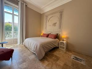 Appartements Domus Romana - Centre ville de Nimes Arenes : photos des chambres