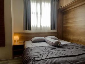 Cozy Studio Emerald Bintaro Icon by alonelyroom