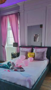 Appartements Suite Romantique La Charmante : photos des chambres