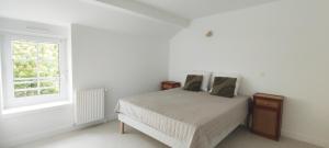 Maisons de vacances Maison en pierre avec jardin a 5 minutes des plages du Cabellou : photos des chambres