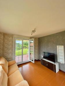 Chalet adosado con amplio jardín