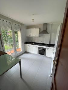 Chalet adosado con amplio jardín