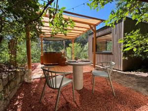 Lodges Kalyva - Nature et Jacuzzi : photos des chambres