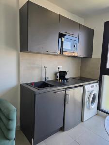 Appartements studio balcon, centre ville, parc expo, Arena : photos des chambres