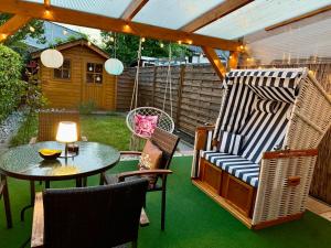 Ganzes Haus mit einer Terrasse, Garten und Klimaanlage
