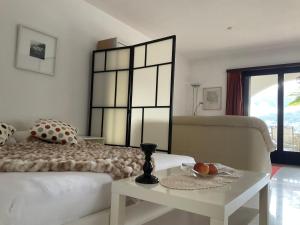 Studio Viramonte - charmantes Apartment mit Pool & Seeblick