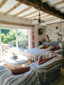 Maisons de vacances La Source de nos Racines, Un moment champetre ! : photos des chambres