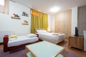 Marousi Deluxe Next to train