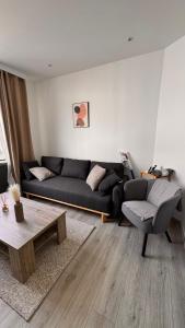 T2 Neuf Quartier Calme central et transport devant