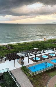 Resort em Barra velha, pé na areia e vista mar