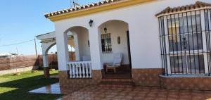 Casa con jardin privado en primera linea de playa