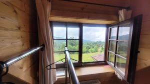 Chata Drapula - Gospodarstwo Agroturystyczne - Apartament na wyłączność z widokiem na góry i aneksem kuchennym