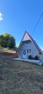 Cottage by the brook