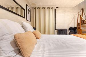 Appartements Duplex Luxe - Sauna & Jacuzzi Privatif : photos des chambres