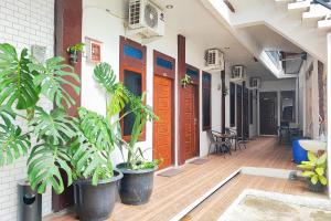 Urbanview Hotel Syariah at Waskita Residence Telanaipura