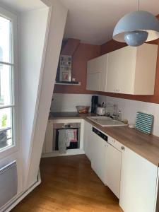 Appartements Apartment with balcony in the 18th : photos des chambres