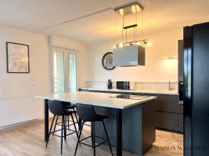 Appartements Le loft de la gare - Hypercentre et vue cathedrale : photos des chambres