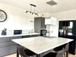 Appartements Le loft de la gare - Hypercentre et vue cathedrale : photos des chambres