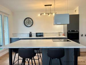 Appartements Le loft de la gare - Hypercentre et vue cathedrale : photos des chambres