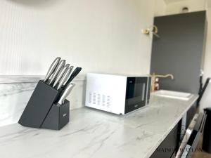 Appartements Le loft de la gare - Hypercentre et vue cathedrale : photos des chambres