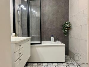 Appartements Le loft de la gare - Hypercentre et vue cathedrale : photos des chambres