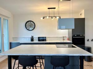 Appartements Le loft de la gare - Hypercentre et vue cathedrale : photos des chambres