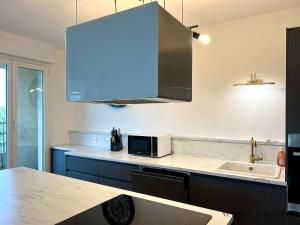 Appartements Le loft de la gare - Hypercentre et vue cathedrale : photos des chambres