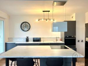 Appartements Le loft de la gare - Hypercentre et vue cathedrale : photos des chambres