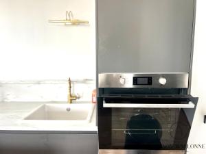 Appartements Le loft de la gare - Hypercentre et vue cathedrale : photos des chambres