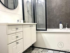 Appartements Le loft de la gare - Hypercentre et vue cathedrale : photos des chambres