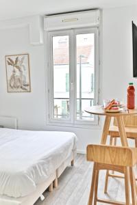 Appartements Petit studio moderne a Asnieres -III : photos des chambres