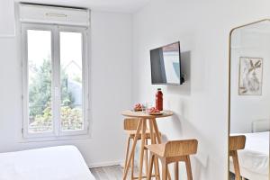 Appartements Petit studio moderne a Asnieres -III : photos des chambres