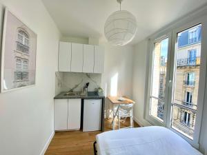 Appartements 443 Suite Gabin - Cosy Apartment Paris Center : photos des chambres