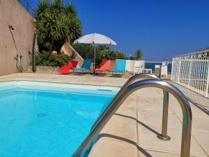 Appartements Appartement Vue Mer a Bastia, terrasse et piscine privee. : photos des chambres