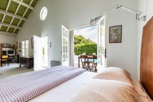 Appartements La Maison Des Voyages : photos des chambres