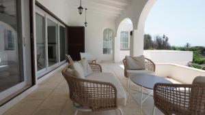 Villa en primera linea de mar cerca de Binibeca