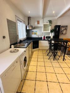 Maisons de vacances Triplex cosy au coeur du village : photos des chambres